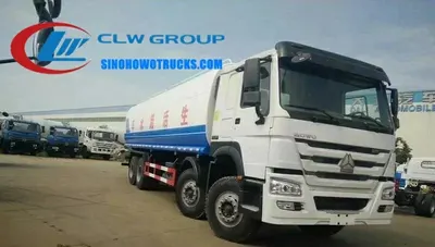 Side view of the HOWO water tanker showing front, rear, and side spray nozzles