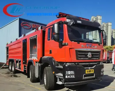 Sinotruk SITRAK 12 wheel fire fighting truck in fire service red with roof mounted monitor and hose lockers