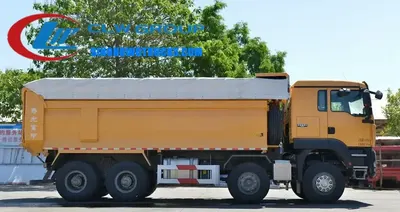 12 wheeler Sino SITRAK gravel truck in sapphire blue with front lifting tipper body and 8x4 chassis