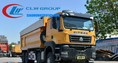 Front view of the Sino SITRAK heavy duty dump truck showing cab, headlamp shield, and warning light