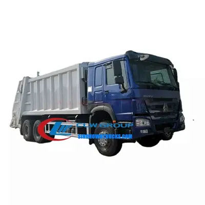 Rear view of the 16cbm garbage truck with compaction chamber open and waste being loaded
