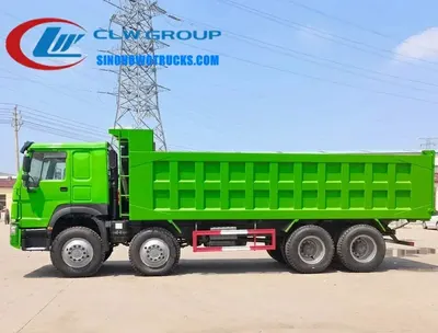 Side view of the HOWO dump truck with open tipper body and high-strength steel construction