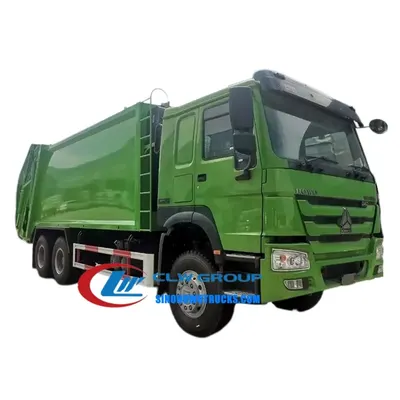 Side view of the Howo garbage truck with 12R22.5 tubeless tyres and 70° tiltable cabin