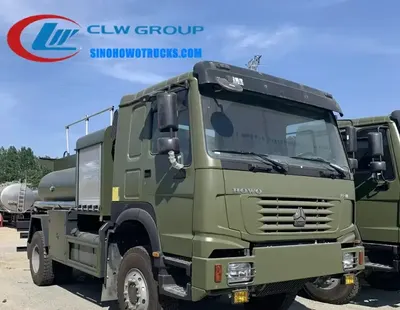 Side view of the HOWO fuel truck showing aluminum oil tank and bottom valve
