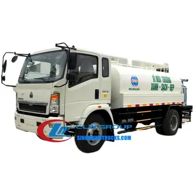 Side view of the water truck with front nozzle and side spray system mounted