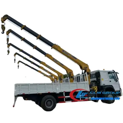 Rear view of the truck crane with the float three-point bridge structure and hydraulic system visible