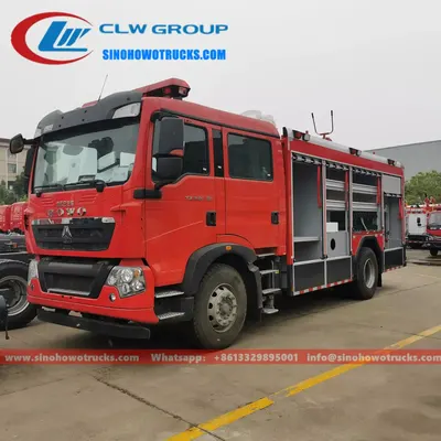 Side view of the HOWO fire truck with aluminium alloy roller shutter lockers open