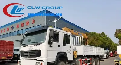 6WD Sinotruk HOWO double cabin all drive telescopic boom truck in Nigeria with crane extended and cargo box loaded