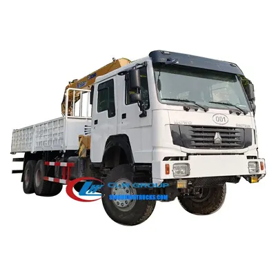 Rear view of the HOWO crane truck with the cargo box and crane base structure