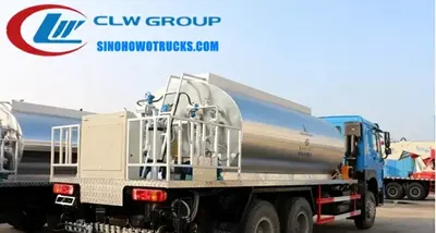 6x4 Sinotruk HOWO 16 ton emulsion distributor truck in road construction livery with rear spray system and control panel