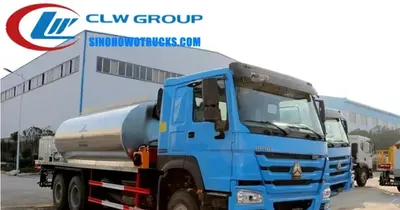 Rear view of the asphalt distributor truck showing the 16000L tank and dual control platform