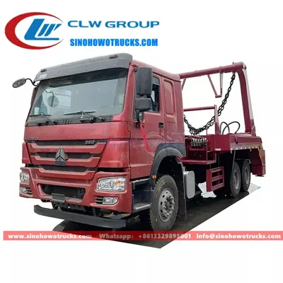 6x4 Sinotruk HOWO 16 ton skip loader truck with detachable skip body in urban waste collection setting
