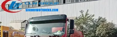 6x4 Sinotruk HOWO 336HP sewage suction truck in standard grey with rear tailgate fully open