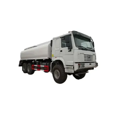 Side view of the HOWO water tanker showing the 1200R20 tires and stainless steel tank lining