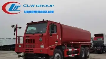 6x6 Sinotruk HOWO 20t off road water tender truck in field operation with rear spray system active