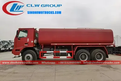 Side view of the 6x6 HOWO water tanker showing the 12.00R20 tires and rear working platform