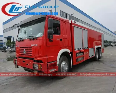 Side view of the 6x6 Sinotruk HOWO fire truck showing the 12.00R20 tires and 6x6 drive configuration