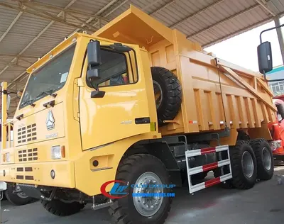 Rear view of the HOWO 70 ton dump truck with side-tilt tipper body in open position