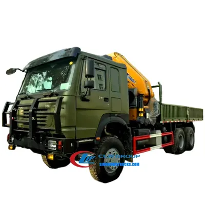Rear view of the 6×6 HOWO crane truck with the crane mounted on the rear and hydraulic lines visible