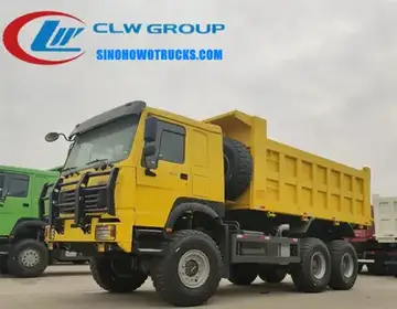 6×6 Sinotruk HOWO off road dump truck in rugged terrain with hydraulic rear lift engaged