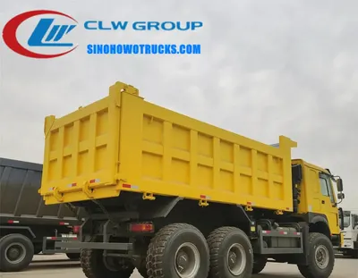 Rear view of the 6×6 HOWO dump truck with hydraulic lift system and reinforced frame