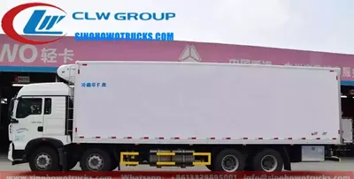 8x4 Sinotruk HOWO 30 ton vegetable and fruit frigo truck in white with refrigeration unit and polymer composite body