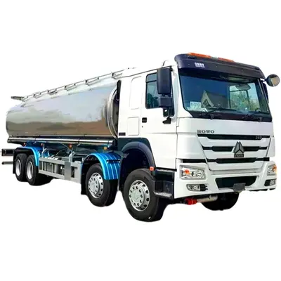 Rear view of the fuel tanker with two warning lights and the refueling hose mounted on the side