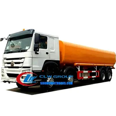 Side view of the HOWO water tanker showing spray nozzles and stainless steel tank option