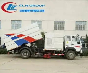 CNHTC Steyr 16cbm street sweeping truck in grey with front-mounted sweeping brooms and vacuum nozzles