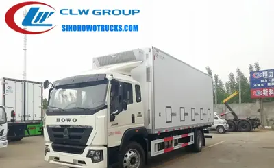 Rear view of the chick transport truck with large access door and ventilation system