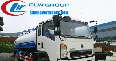Side view of the HOWO toilet cleaning truck showing the 10000 L carbon steel tank and access doors