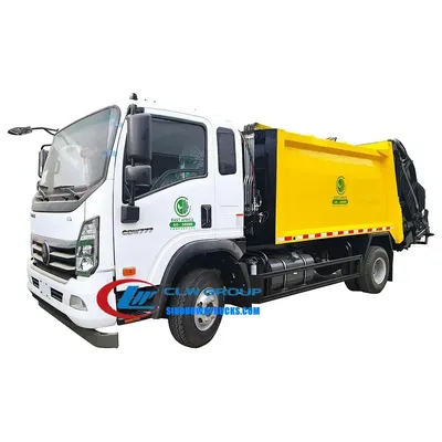 Side view of the HOWO compactor truck showing high-strength T420 steel body and hydraulic cylinders