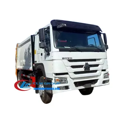 Side view of the HOWO garbage compactor showing high-strength T420 steel body and sealed dustbin