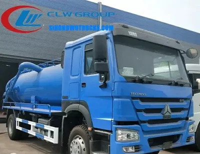 Side view of the HOWO sewer tanker showing the 16000 litre cylindrical tank and suction pipe access