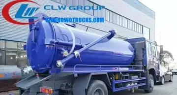 HOWO 12cbm vacuum sewage truck in service in Equatorial Guinea with rear hydraulic door open and suction hose extended