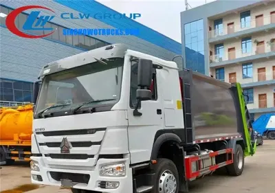 Rear view of the HOWO compact bin truck showing hydraulic compaction system and sealed discharge door