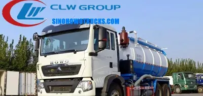 HOWO 18tons vacuum tank truck Chad in service with hydraulic tailgate open and suction hose extended