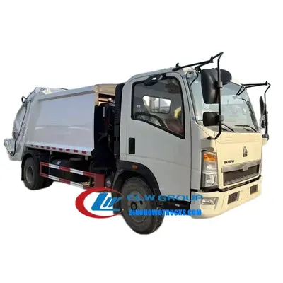 Rear view of the HOWO 5 ton compactor truck showing hydraulic compaction system and filler entrance