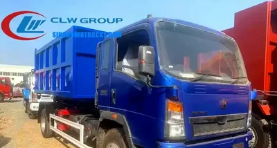 Interior cab of the HOWO 5cbm hooklift truck with electrical control panel and driver seat