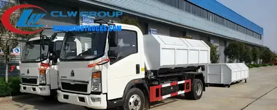 Rear view of the HOWO mini hook loader showing the hydraulic hook boom and container locking mechanism