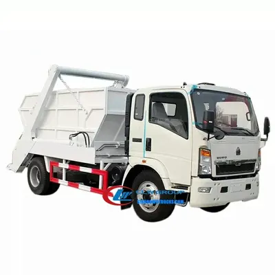 Close-up of the swing arm system on the Howo skip waste truck lifting a trapezoidal waste container