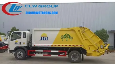 Rear view of the HOWO waste truck showing the bin lifter and compaction mechanism