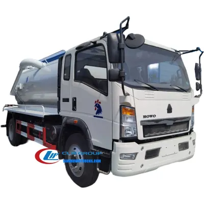 Sinotruk HOWO 4x2 sewer vacuum truck with 5000 litre cylindrical tank in urban street