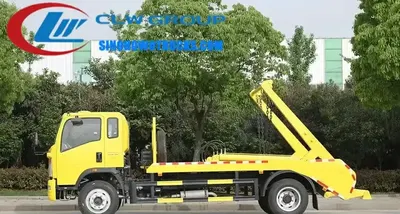 Side view of the HOWO skip loader truck showing the high strength steel swing arm and sealed skip bin