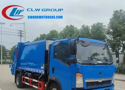 Side view of the HOWO compactor truck showing the 4mm carbon steel compaction body and sealed joints