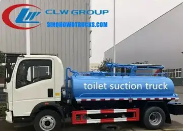 Sinotruk HOWO mini 5000L fecal suction truck in white with front-mounted suction pipe and vacuum pump