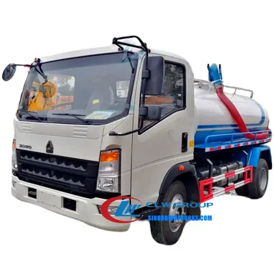 Sinotruk HOWO 4x2 small 5000 litre toilet truck in service with vacuum pump and rear tank door open