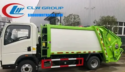 Side view of RHD HOWO 5t compactor truck showing high-strength steel body and dual sewage tanks
