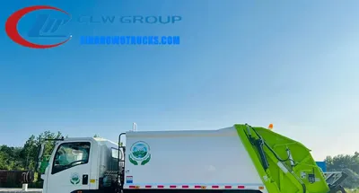 Sino Howo mini rear loader garbage truck in urban waste collection service with compactor body and side loading hatch