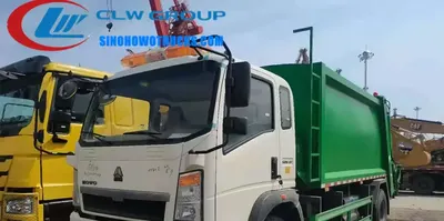 Sinotruk HOWO 8 ton compactor truck in urban waste collection service with hydraulic compaction body